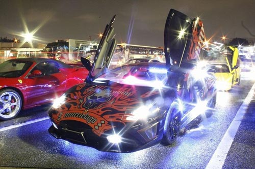 Pictures of a lambo covered with lights that's enough to blind someone off