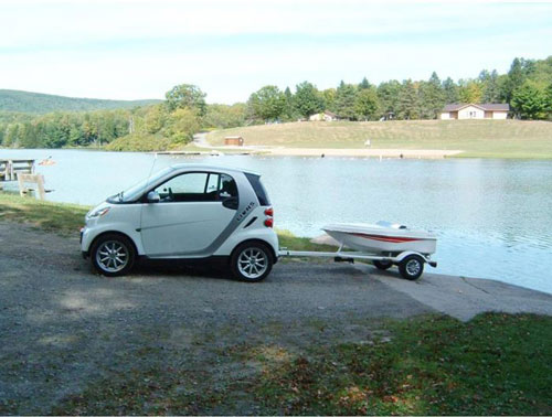 Smart Car Towing A Tiny Boat - Jorymon.com
